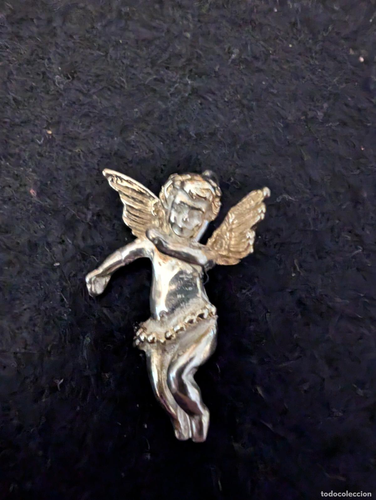 Joyeria: QUERUBIN O ANGEL DE LA GUARDA COLGANTE TRIDIMENSIONAL EN PLATA CON DETALLOS DORADOS. 5,43 gr.