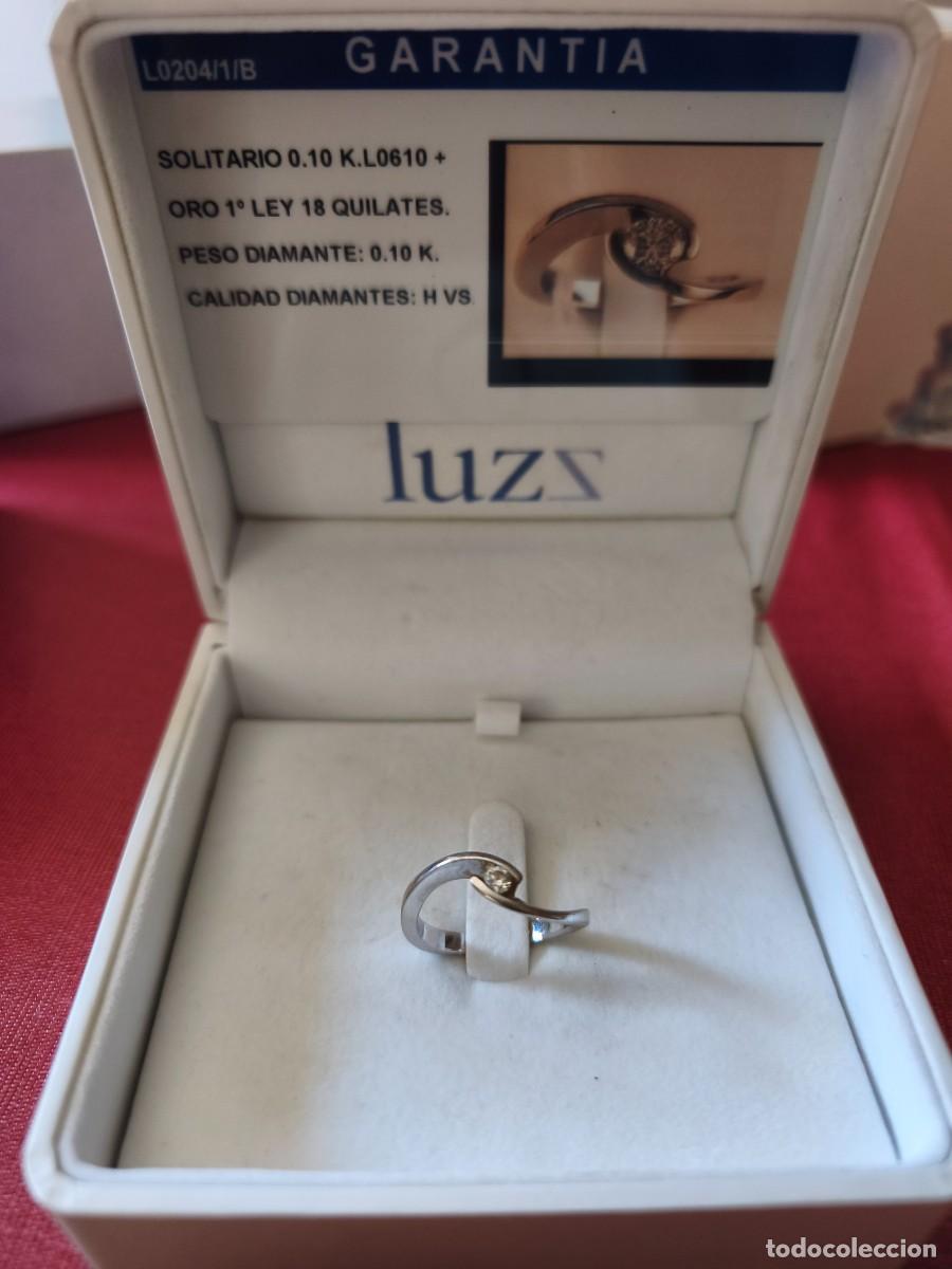 Joyeria: solitario de oro blanco de 1.&ordf; ley de 18 quilates con un diamante de 0,10 quilates de calidad H VS