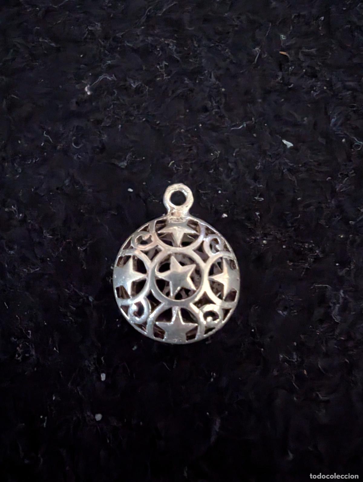 Joyeria: COLGANTE DE PLATA ESFERICO CON ESTRELLAS CALADAS. PESO: 1,92 gr. 1,20 cm