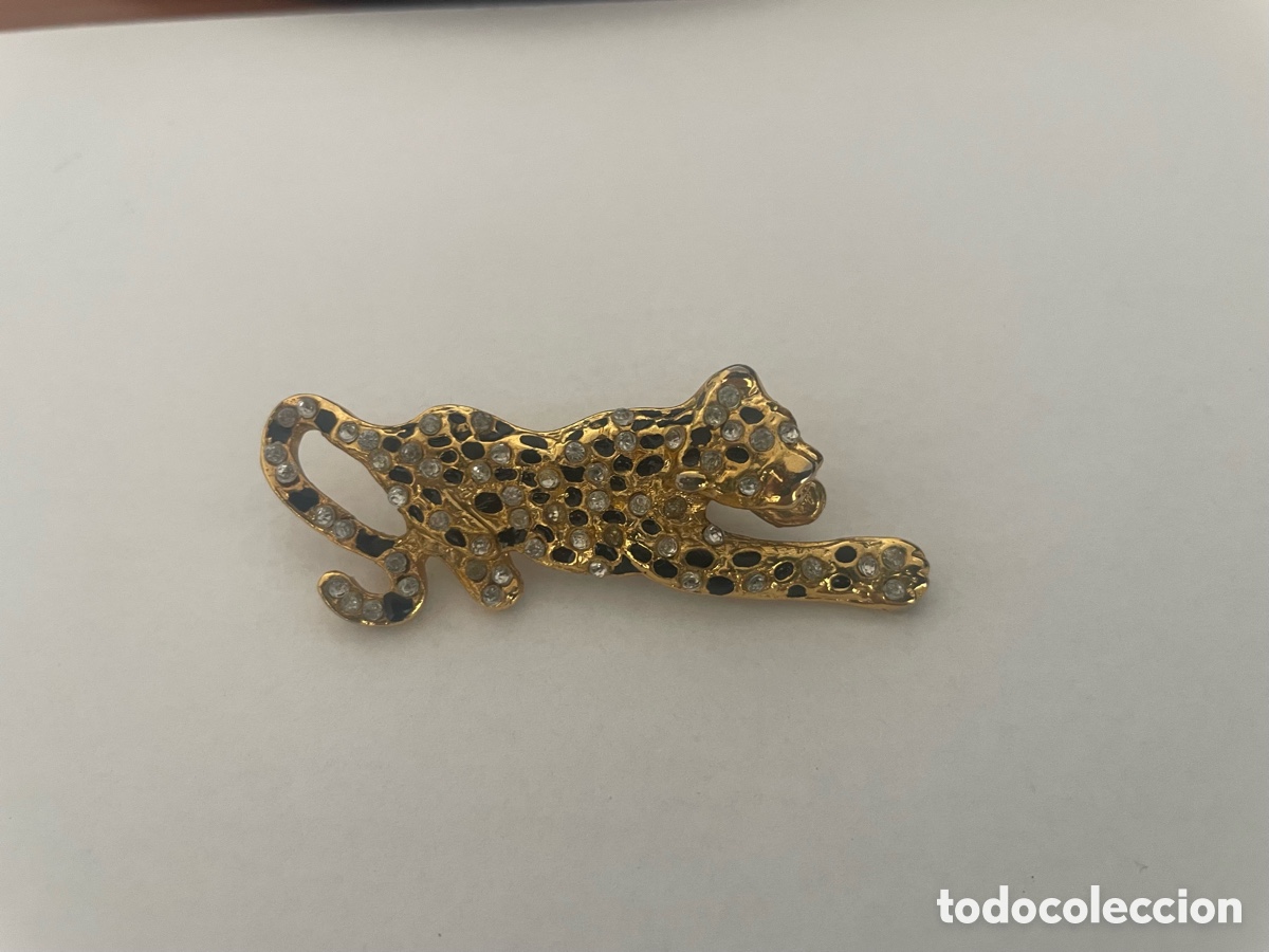 Joyeria: broche en forma leopardo incrustado cristales