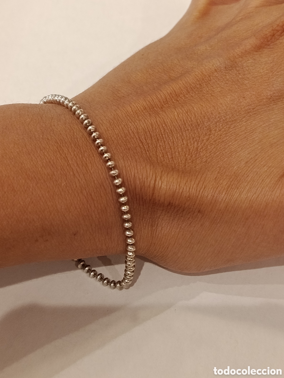 Joyeria: Pulsera de bolitas de plata.