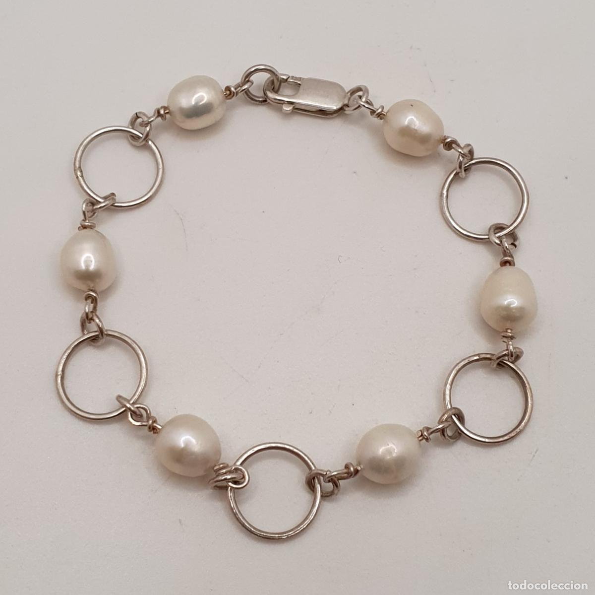 Joyeria: Elegante pulsera en plata de ley 925 con aros entrelazados y bellas perlas cultivadas aut&eacute;nticas.