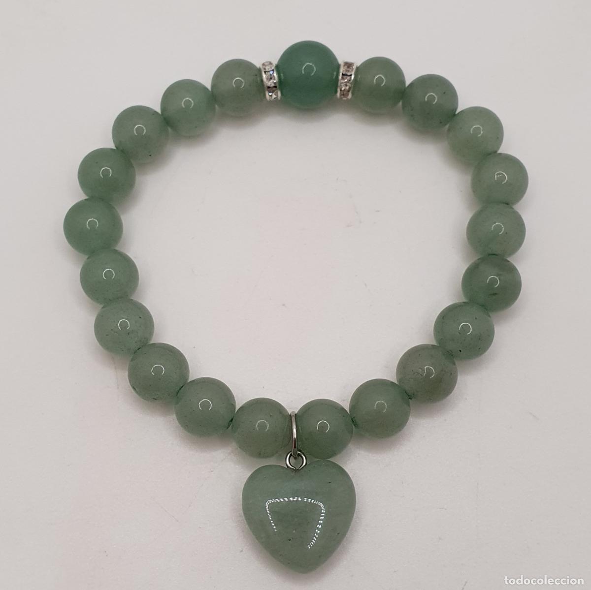 Joyeria: Bella pulsera de esferas de aventurina, con coraz&oacute;n central y cuentas de metal con circonitas.