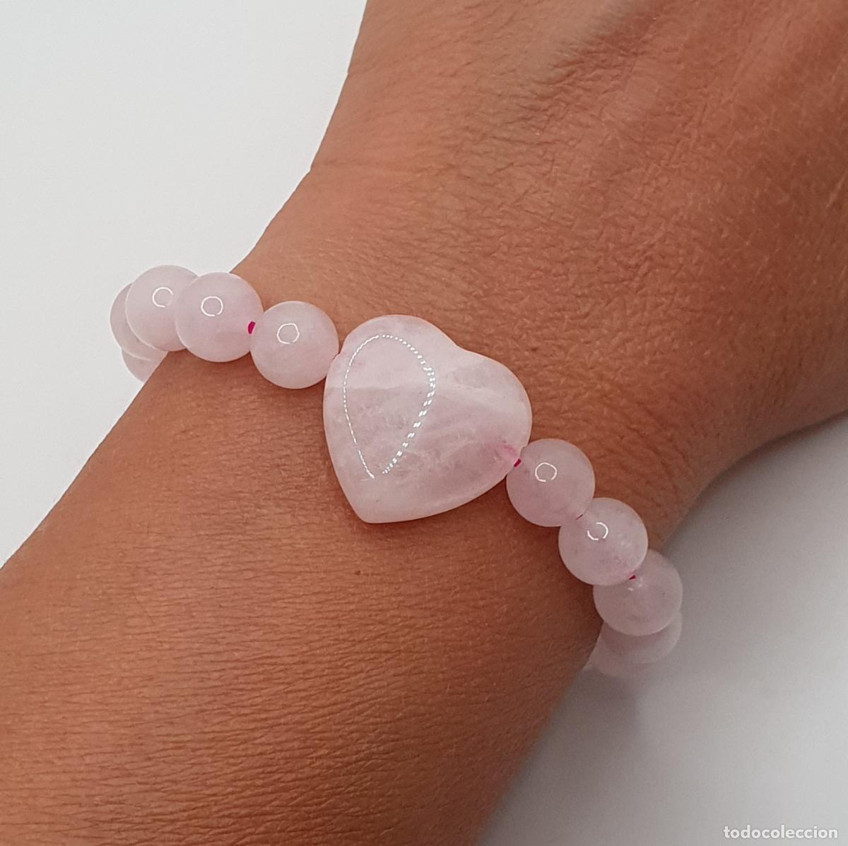 Joyeria: Excelente pulsera de esferas de cuarzo rosa aut&eacute;ntico con bello coraz&oacute;n central, piedra del amor.