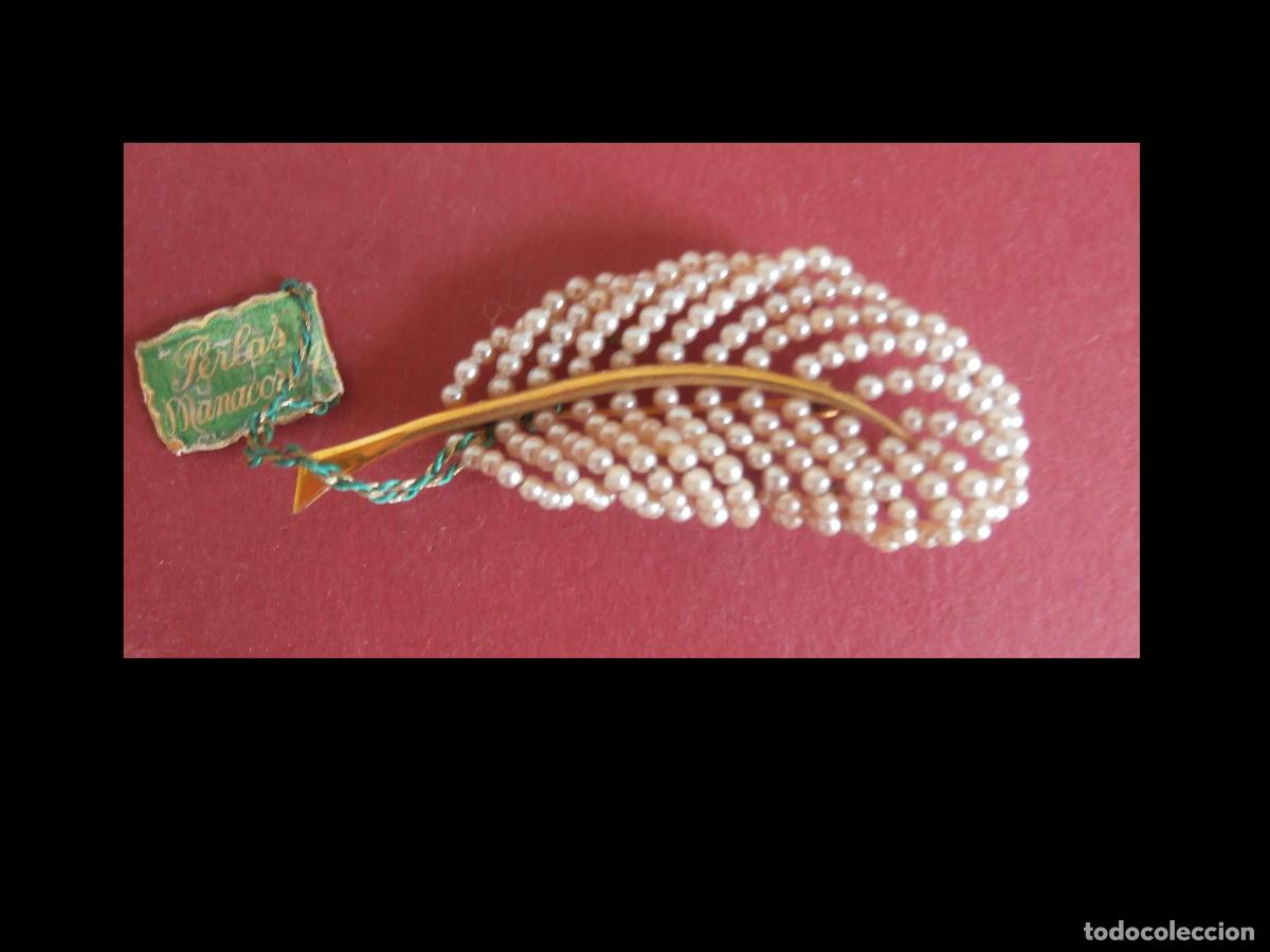 Joyeria: Broche en forma de pluma de perlas de Mallorca