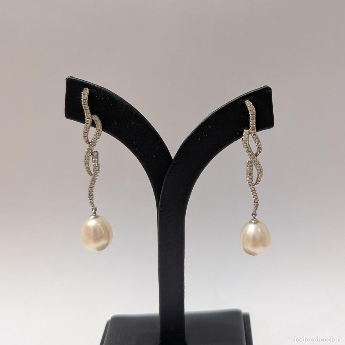 Joyeria: Pendientes largos de oro blanco, diamantes y perlas