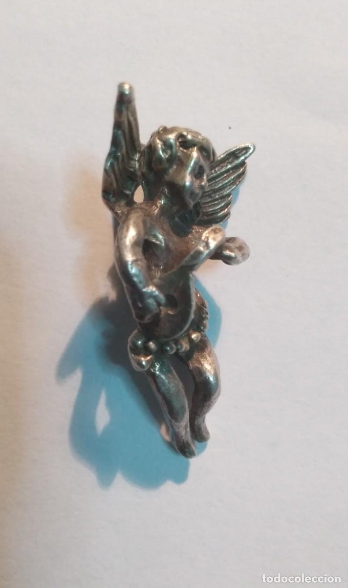 Joyeria: Colgante en plata de ley Angel o Querub&iacute;n tocando la&uacute;d.