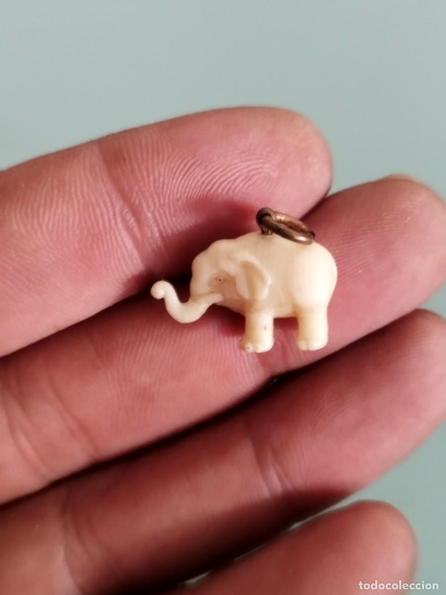 Joyeria: Peque&ntilde;o colgante figura de elefante.