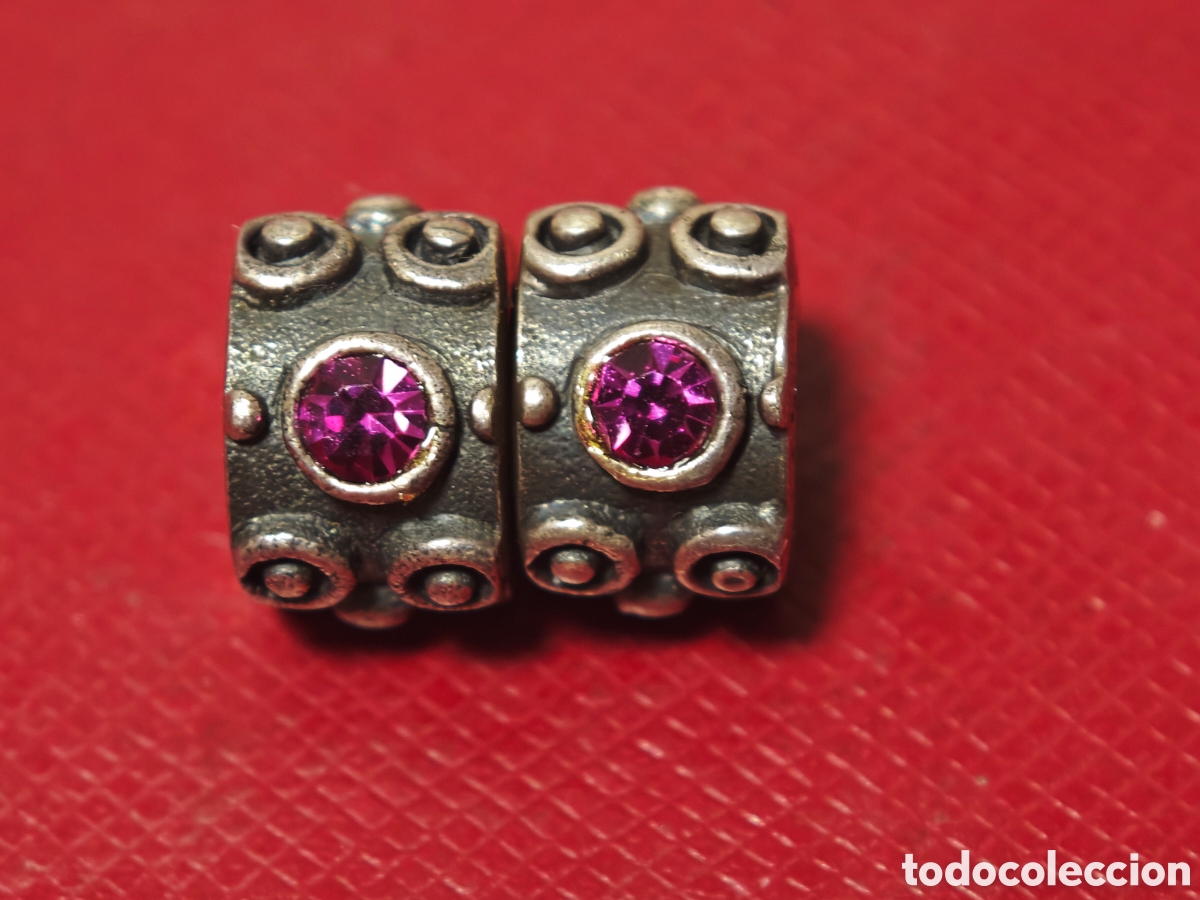 Joyeria: 2 charm en plata con piedra rosa