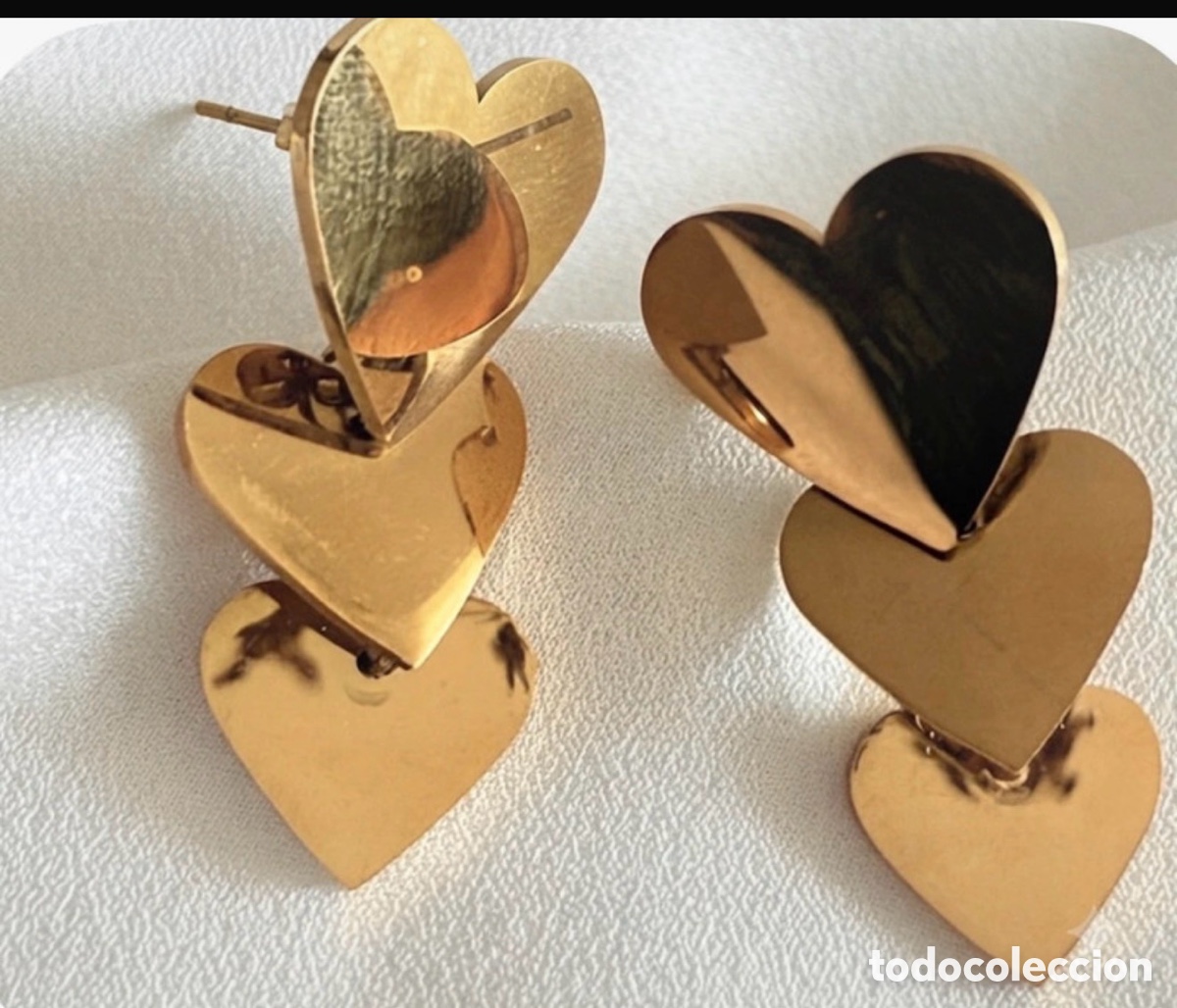 Joyeria: Pendientes dorados preciosos