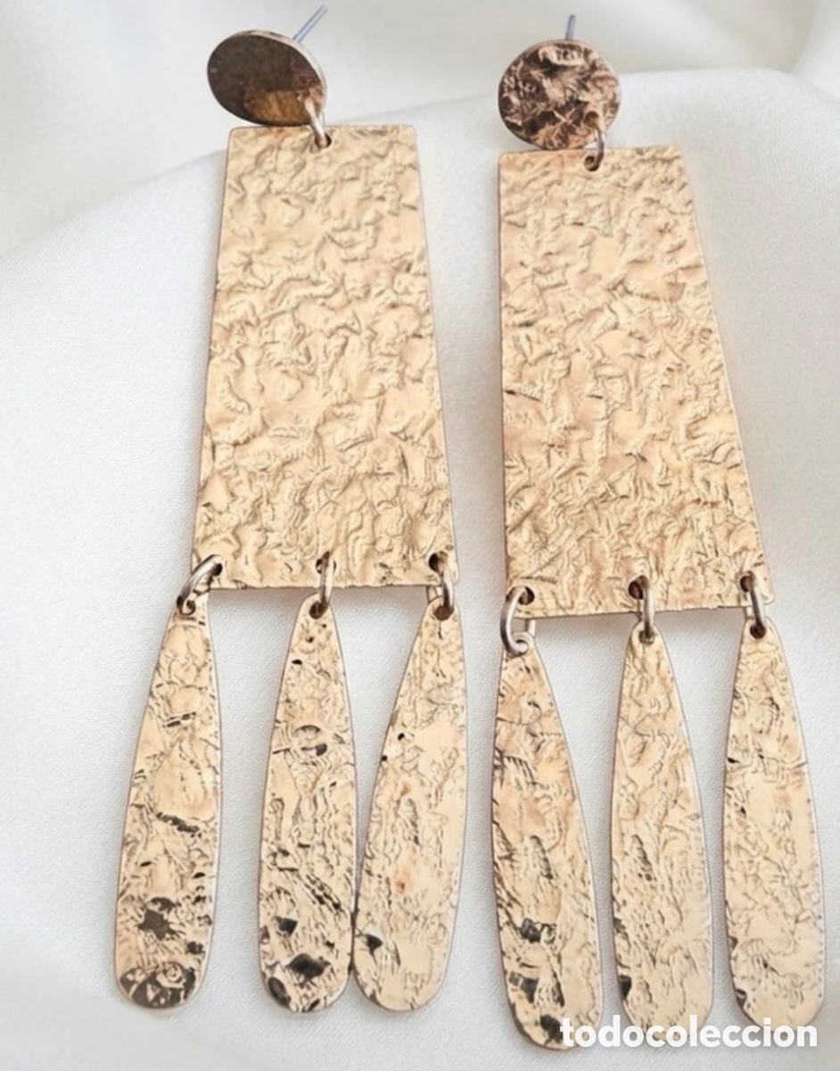 Joyeria: Pendientes dorados preciosos