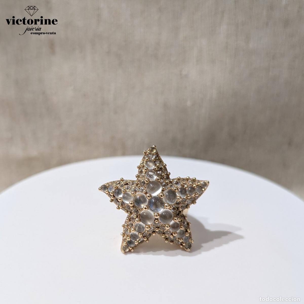Joyeria: Anillo Pomellato Sirene, oro, piedras de luna y topacios