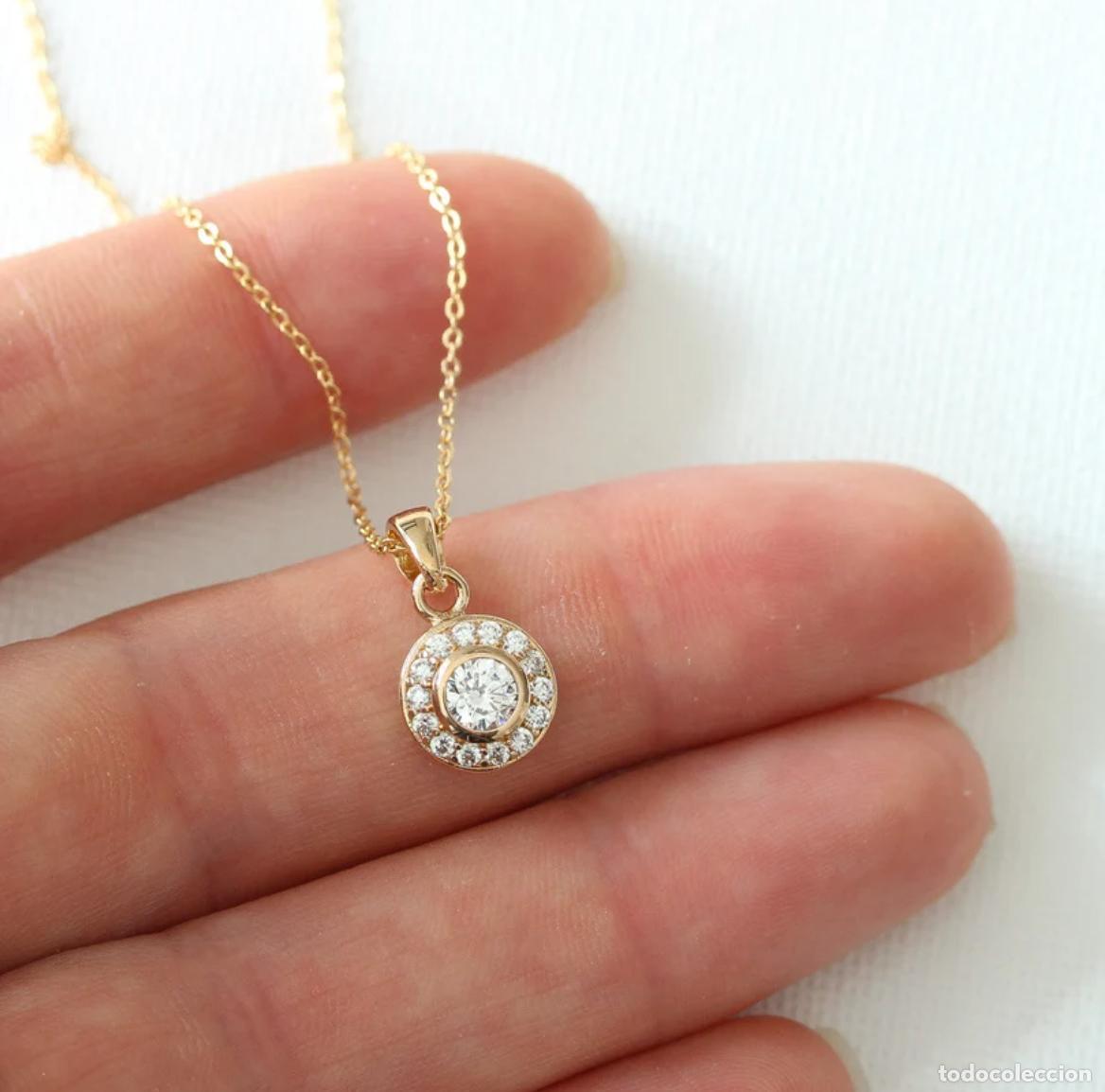 Joyeria: Colgante de circonita c&uacute;bica pav&eacute; ba&ntilde;ado en oro.