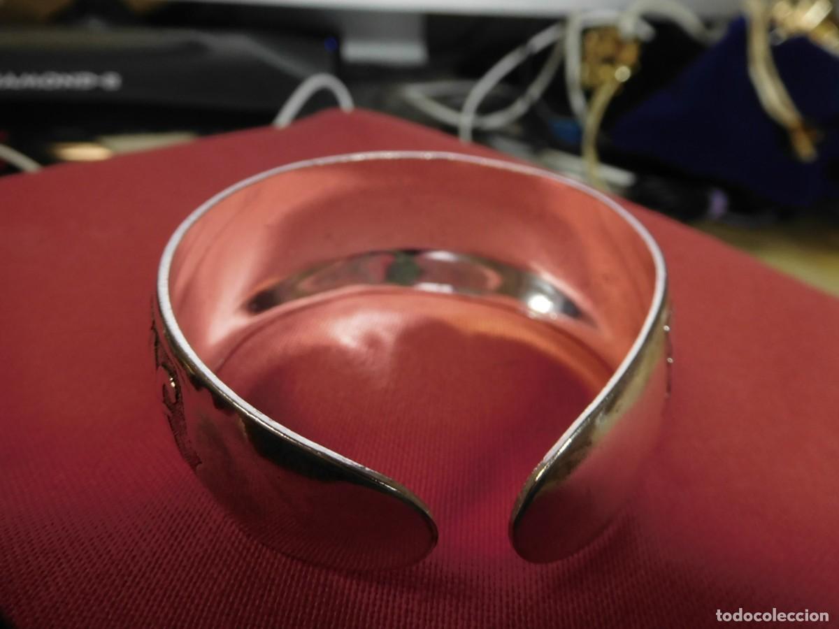 Joyeria: Pulsera de plata, ley 925, ancha, adornada por animales
