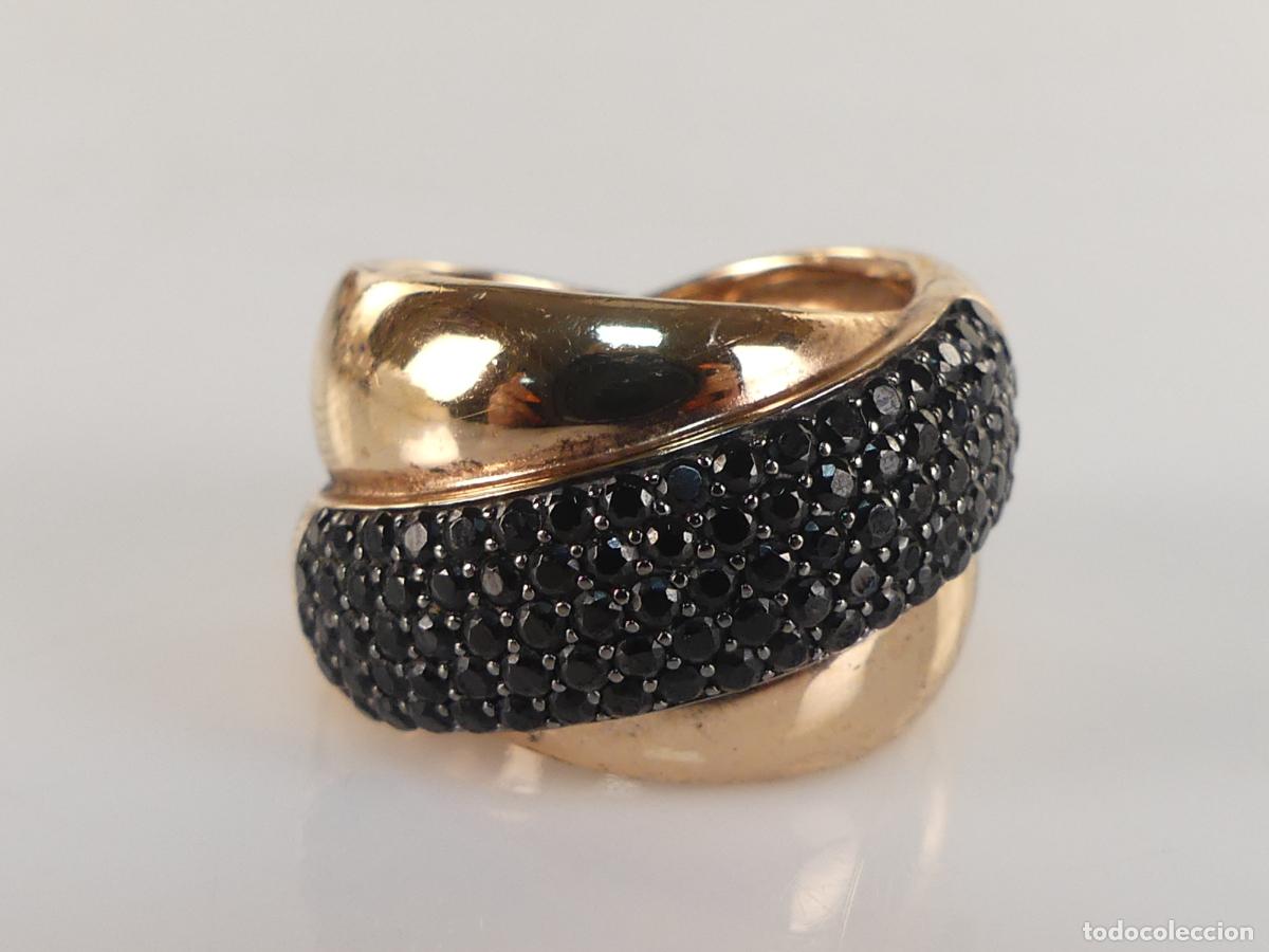 Schmuck: ELEGANTE ANILLO DORADO DECORADO CON PIEDRAS
