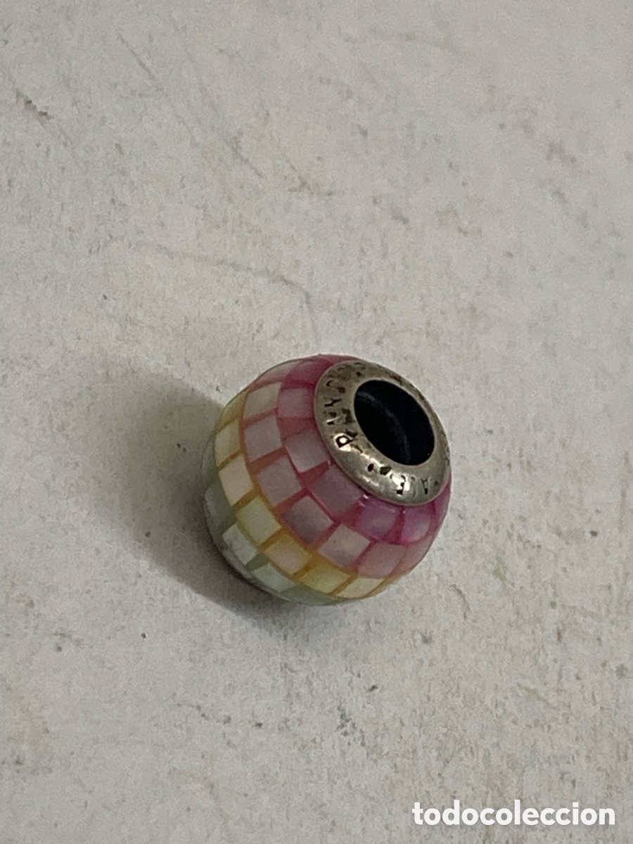 Joyeria: Entre pieza de plata y n&aacute;car C644