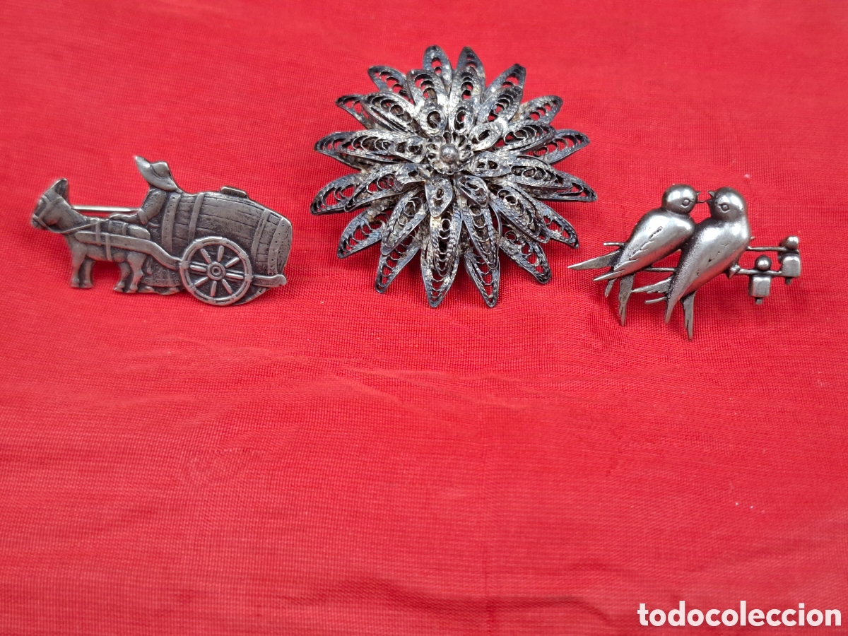 Joyeria: Broches de plata 800 y filigrana.