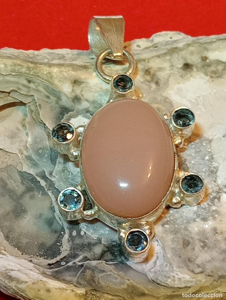 Joyeria: COLGANTE TORTUGA CON &Oacute;PALO ROSA Y TOPACIOS AZULES NATURALES (SIN USAR)