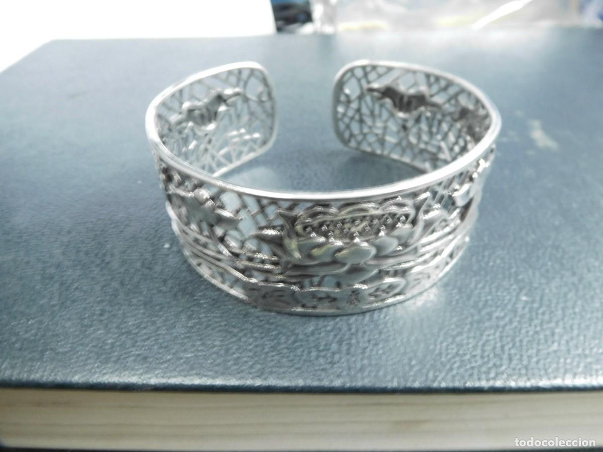 Joyeria: Pulsera calada muy elegante, ancha, brillante