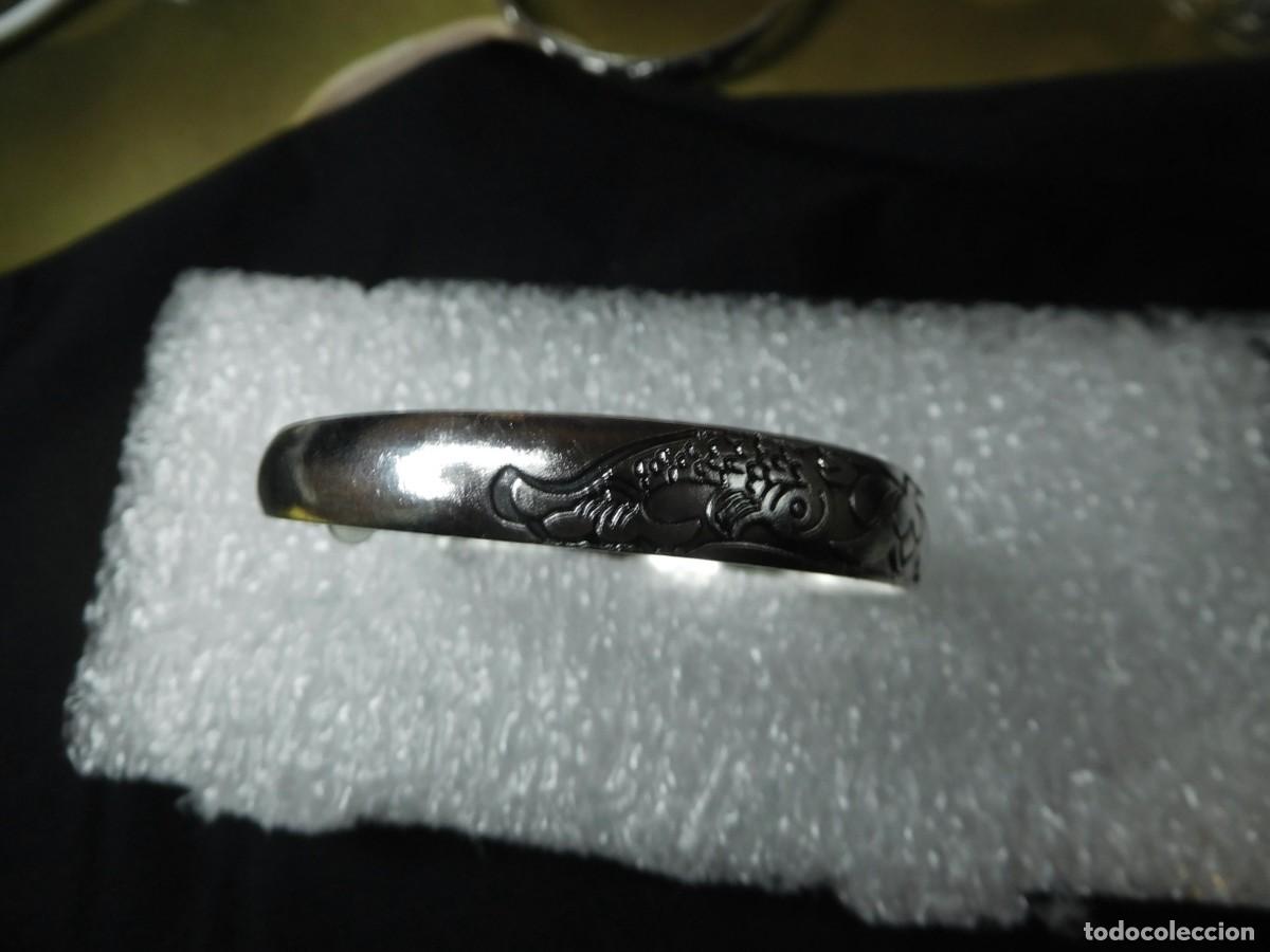 Joyeria: Brazalete de acero inxidable y titanio