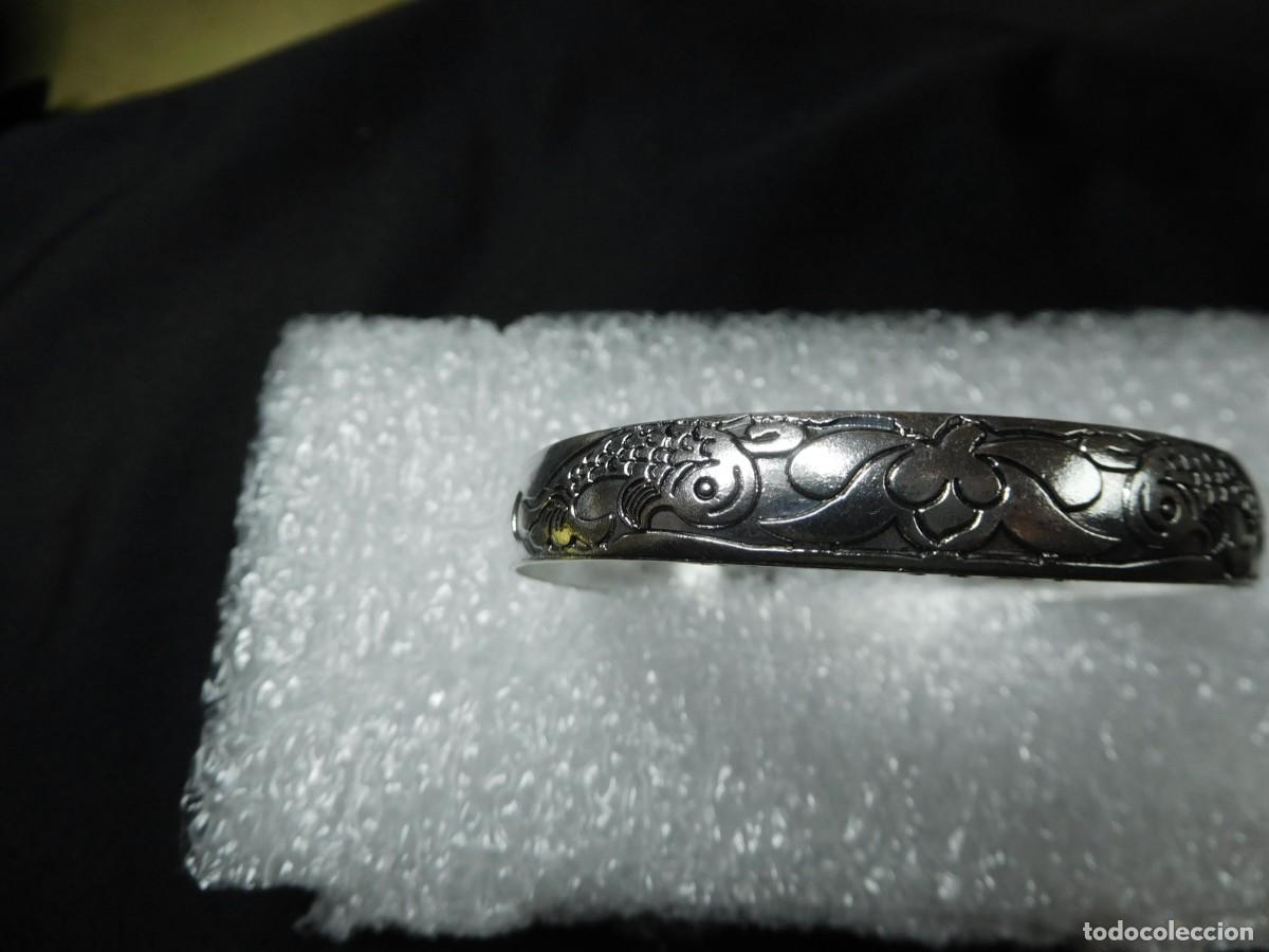Joyeria: Brazalete de acero inxidable y titanio