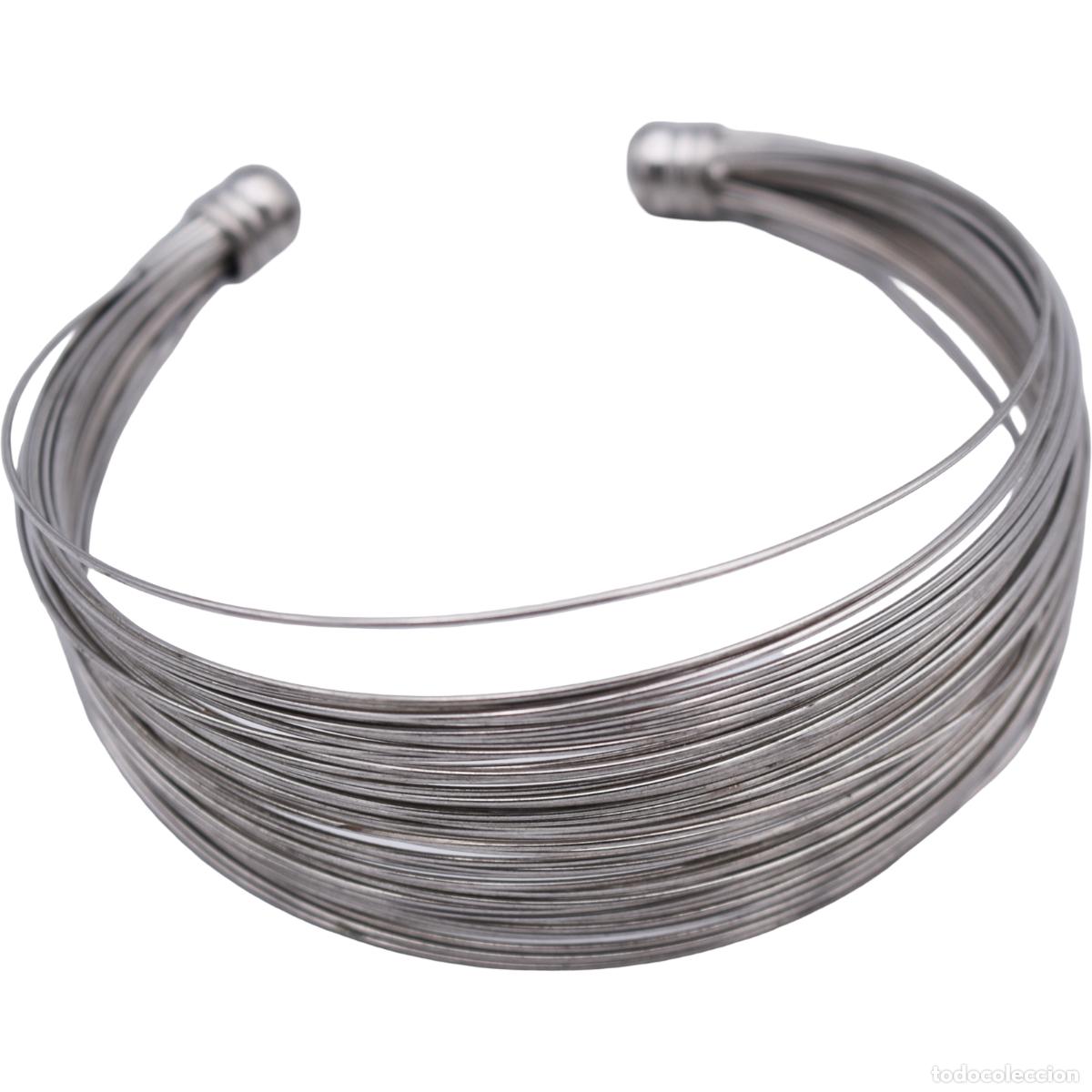 Joalharia: Pulsera de metal ajustable