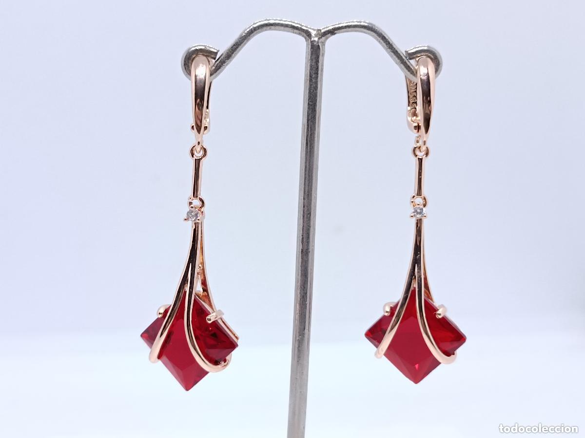 Jewelry: Elegantes pendientes en oro de 14k con granates tallados