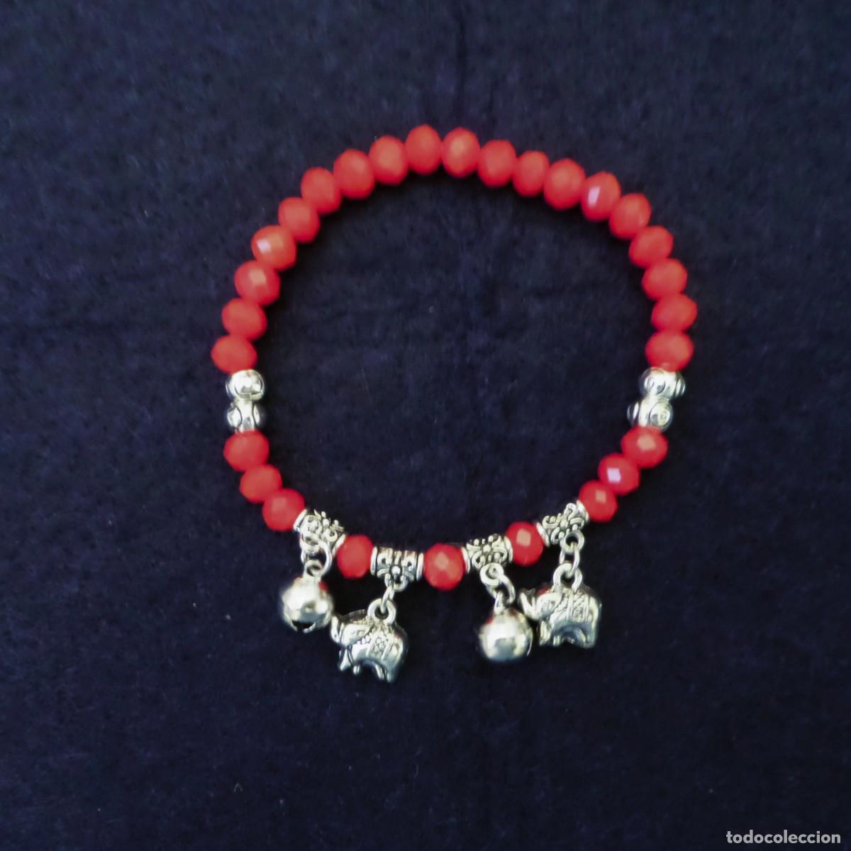 Joyeria: PULSERA ELASTICA SWAROKI ROJAS Y DIGETS ELEFANTES - Foto 1