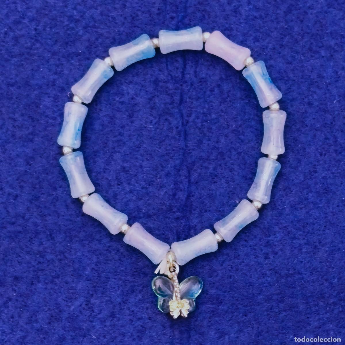 Gioielleria: PULSERA ELASTICA PIEDRAS CON DIGETS MARIPOSA. BOLA 8,5 MM