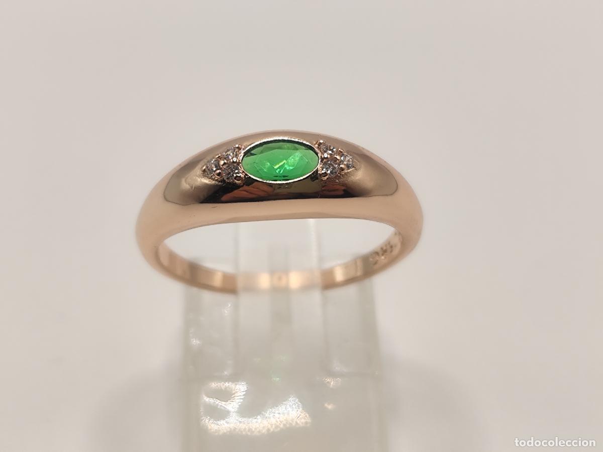 Gioielleria: Elegante anillo en oro de 14k con esmeralda tallada