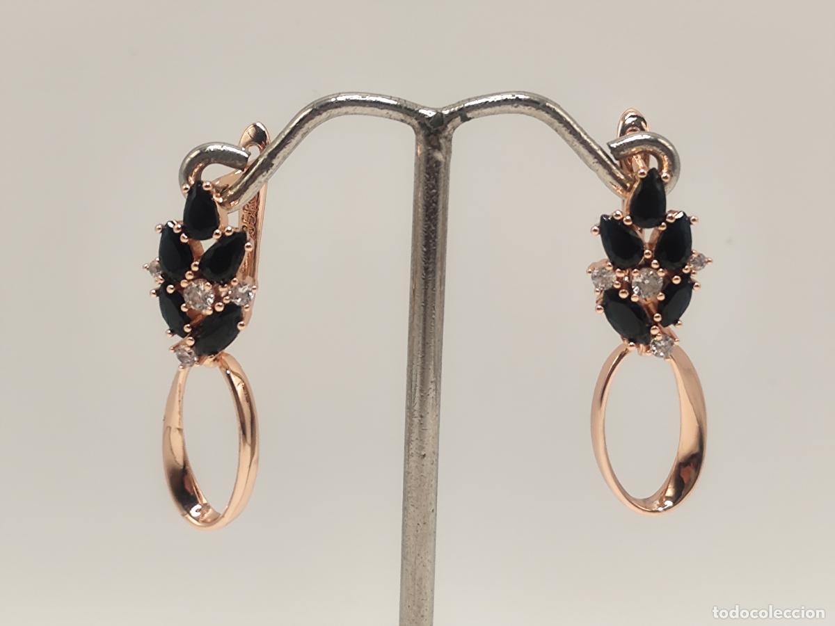 Gioielleria: Elegantes pendientes en oro de 14k con espinelas negras