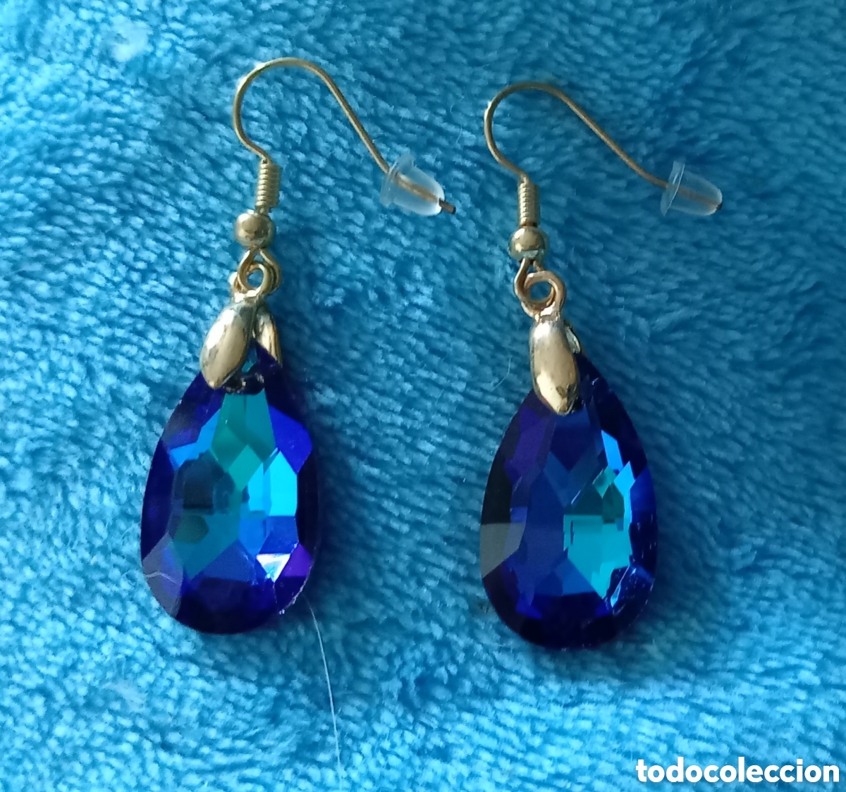 Joyeria: Originales pendientes de gancho dorados gota de agua, l&aacute;grima facetada azul con reflejos 2,5cm Largo