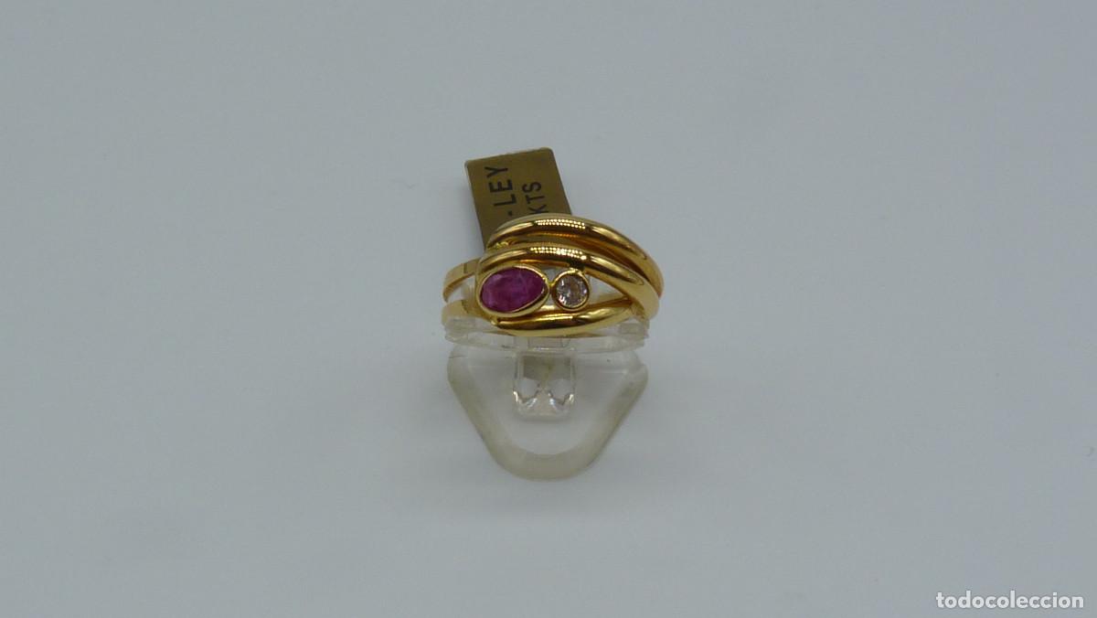 Joyeria: ANILLO RUBI FINO Y CIRCONITAS EN ORO DE 18 KLTES.(750 MM).
