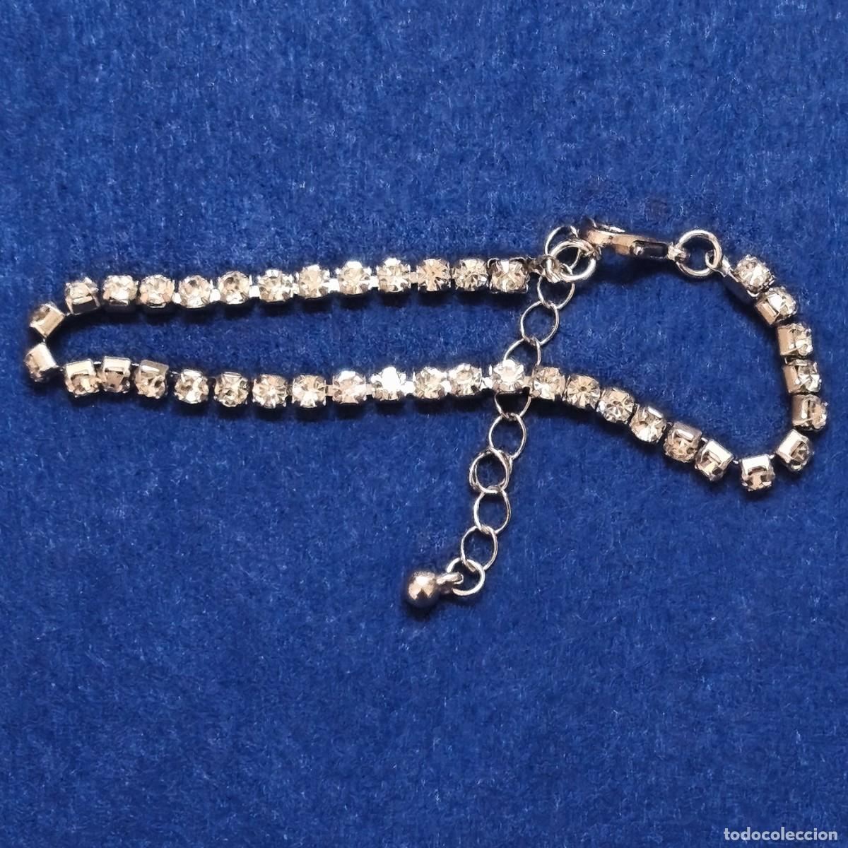 Joyeria: PULSERA RIVIERE DE ALPACA PATEADA Y PIEDRAS SVAROSKI. MED. 18 - 23 CMS