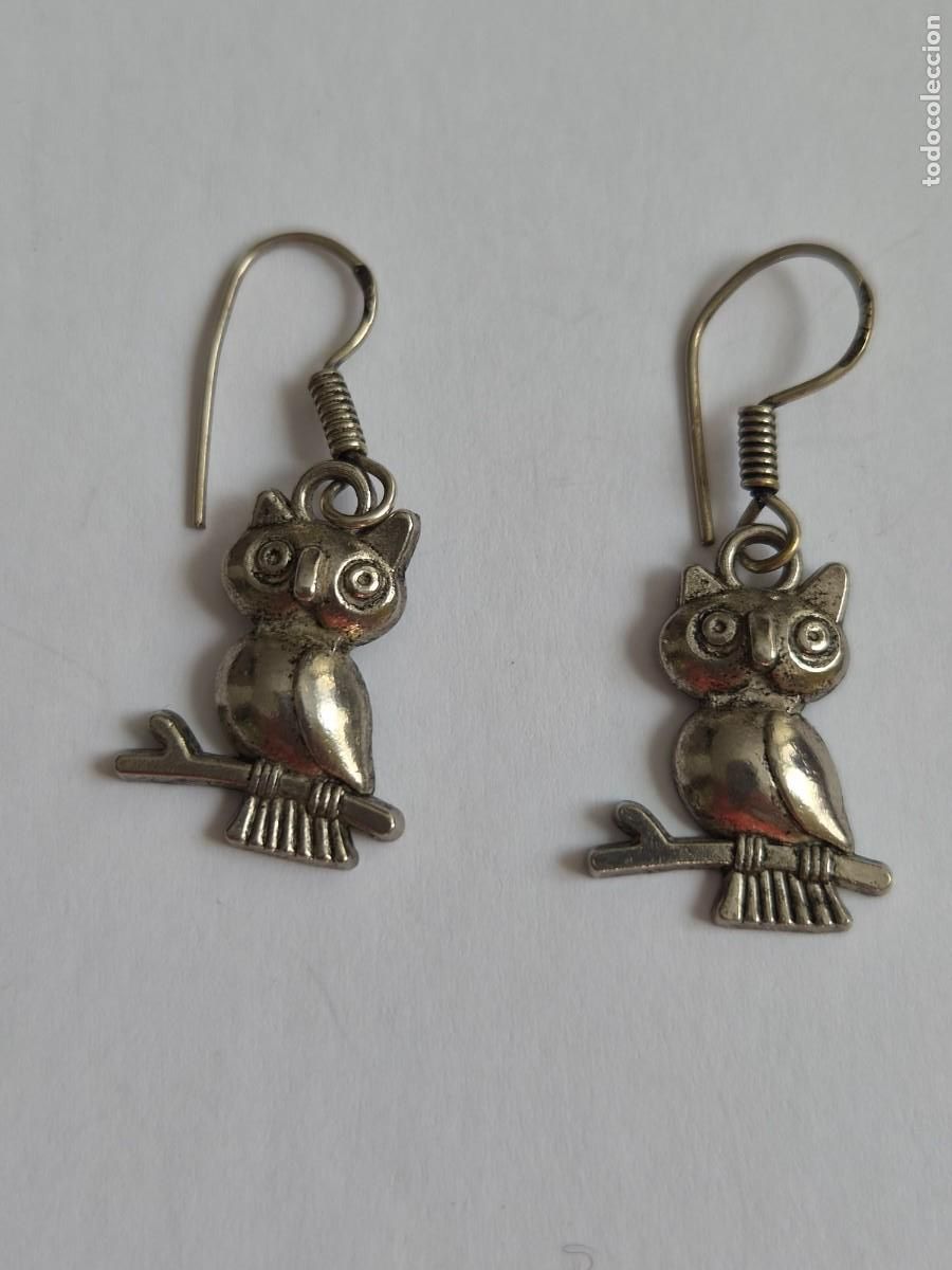 Joyeria: Pendientes de plata con forma de b&uacute;ho sobre una rama 925
