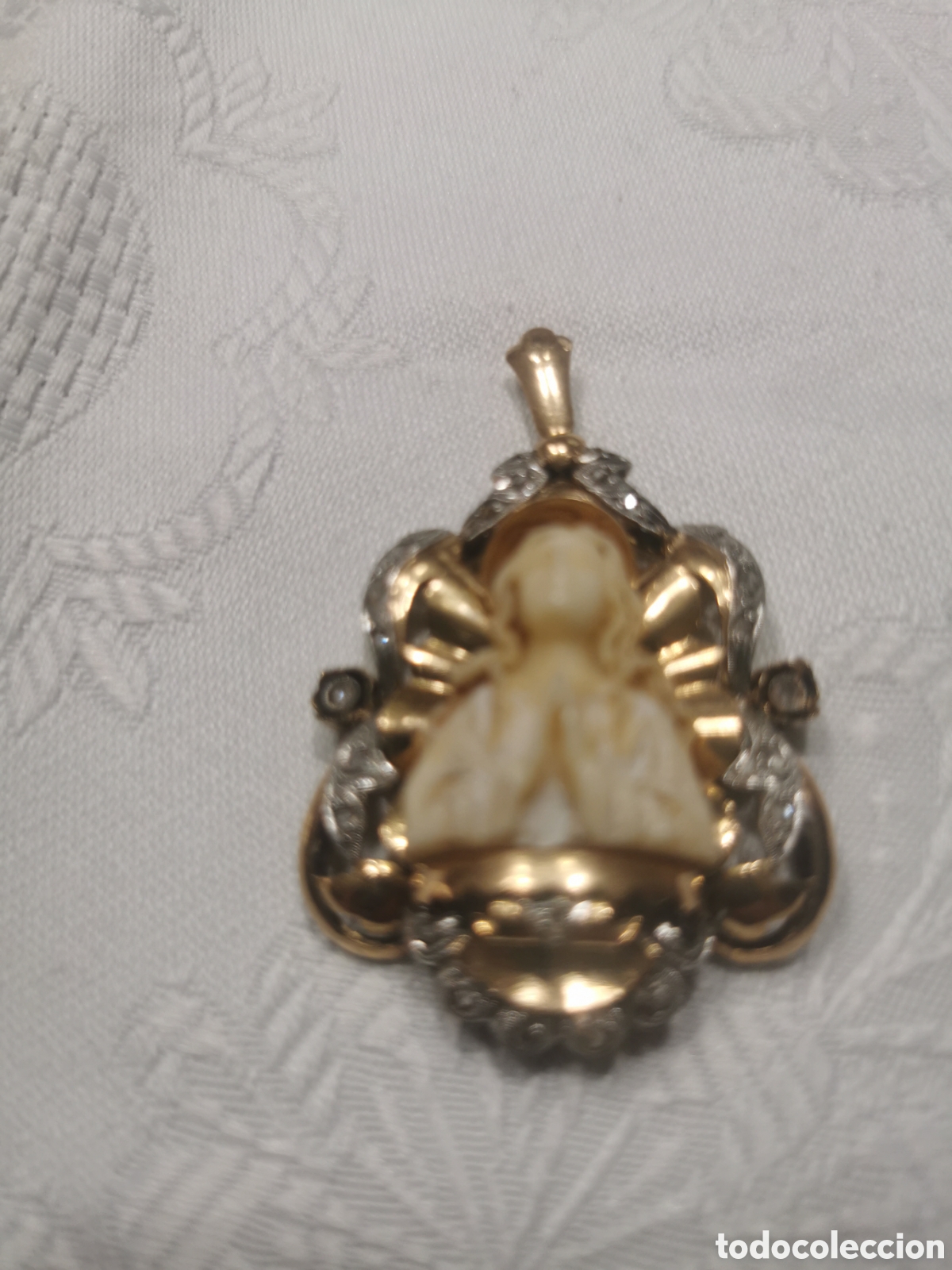 Joyeria: Medalla circa 1949 oro plat&iacute;no diamantes marfil 5cm