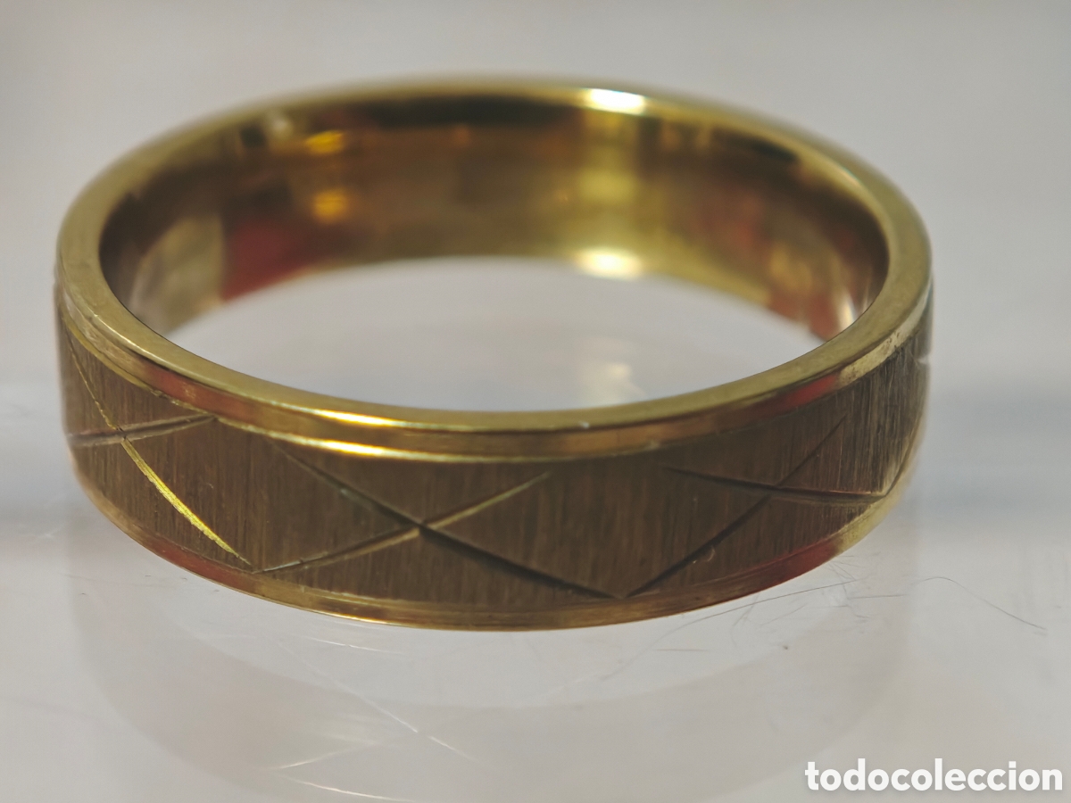 Joyeria: Anillo de hombre de acero con ba&ntilde;o de oro