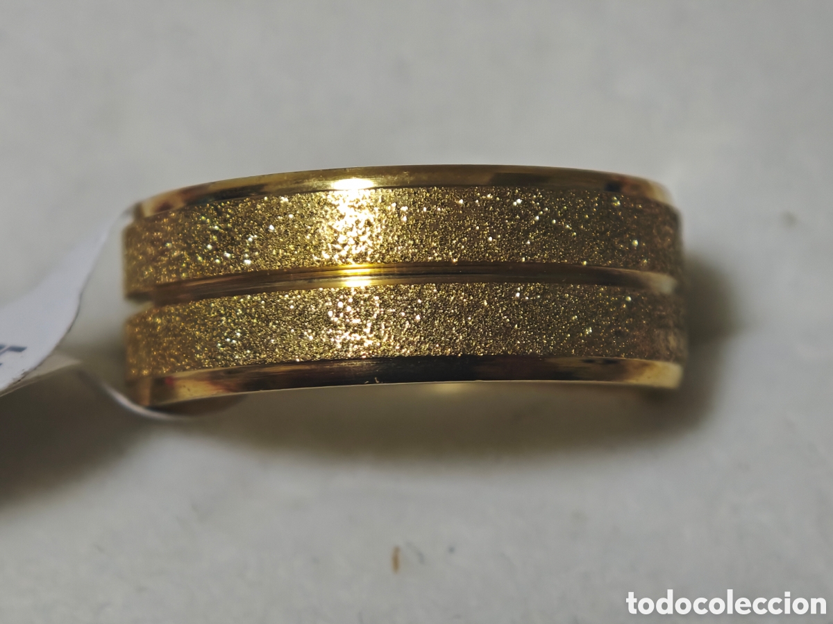 Joyeria: Anillo de acero con ba&ntilde;o de oro