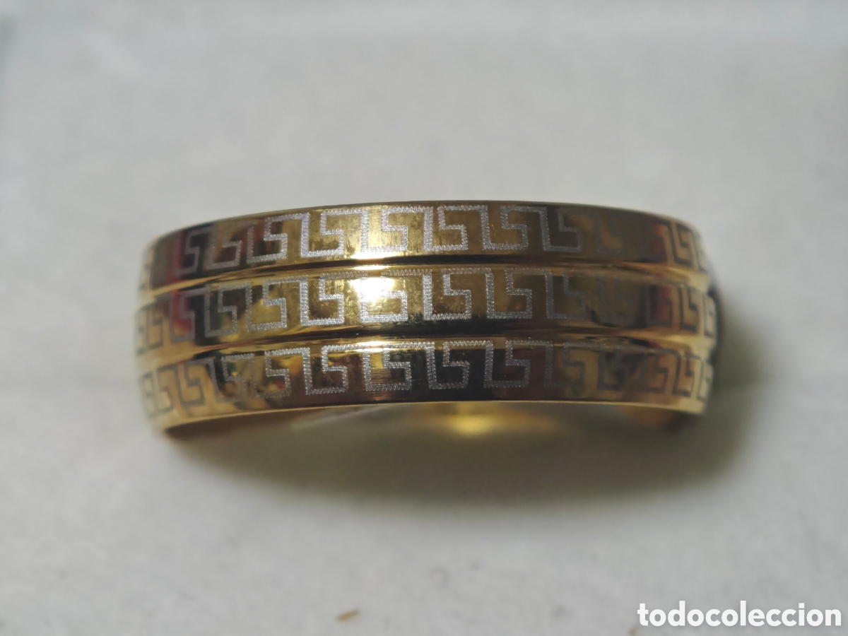 Joyeria: Precioso anillo de acero con ba&ntilde;o de oro