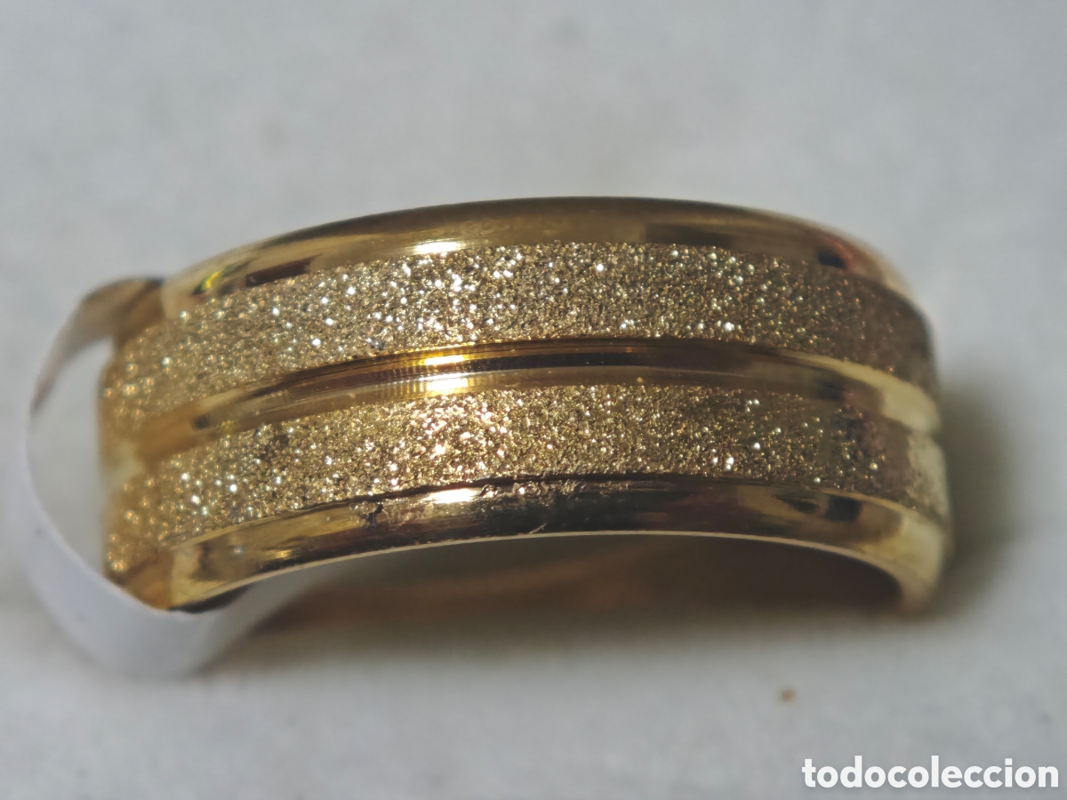 Joyeria: Precioso anillo en acero inoxidable con ba&ntilde;o de oro nuevo