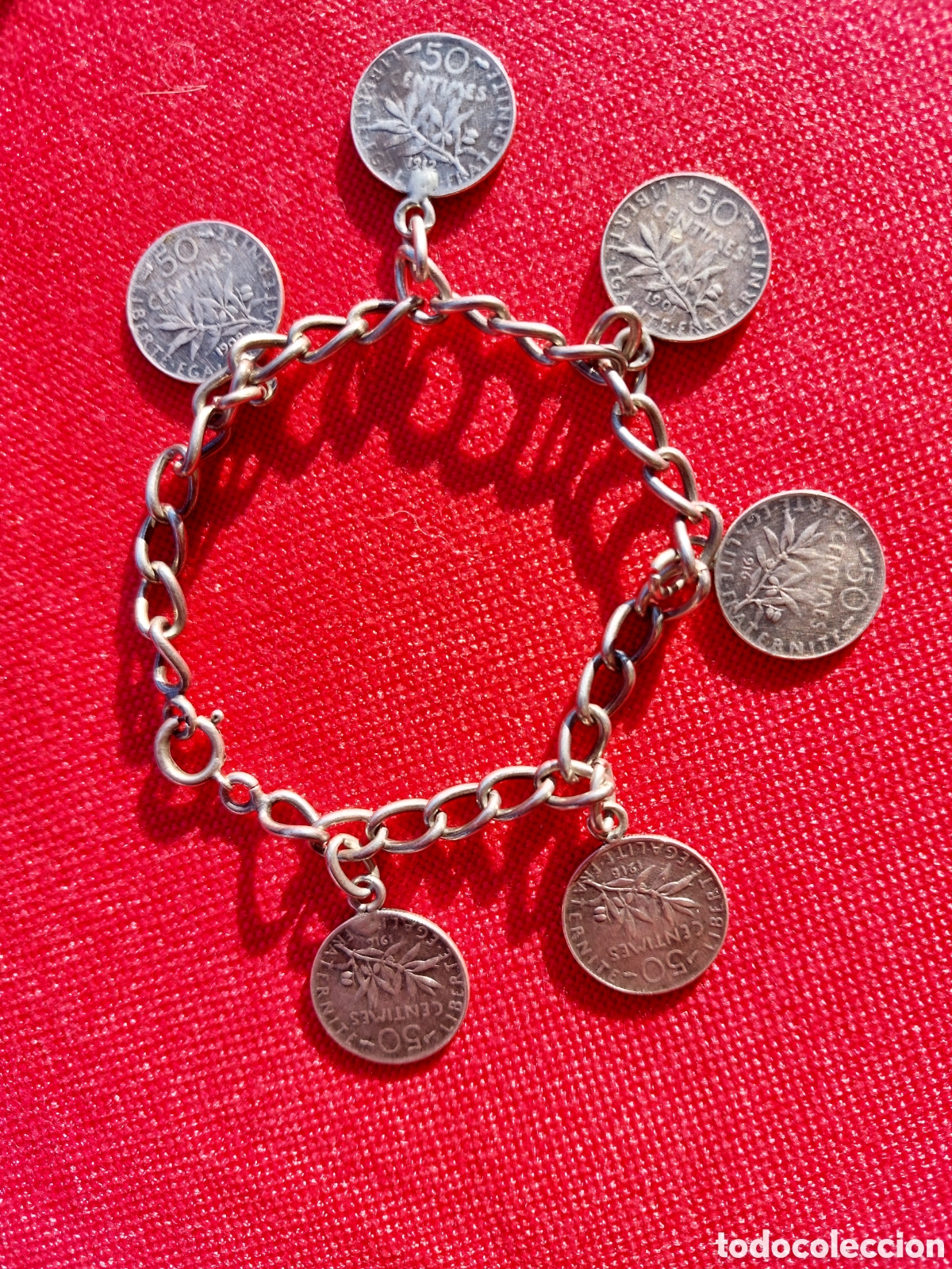 Joyeria: Pulsera de plata con monedas