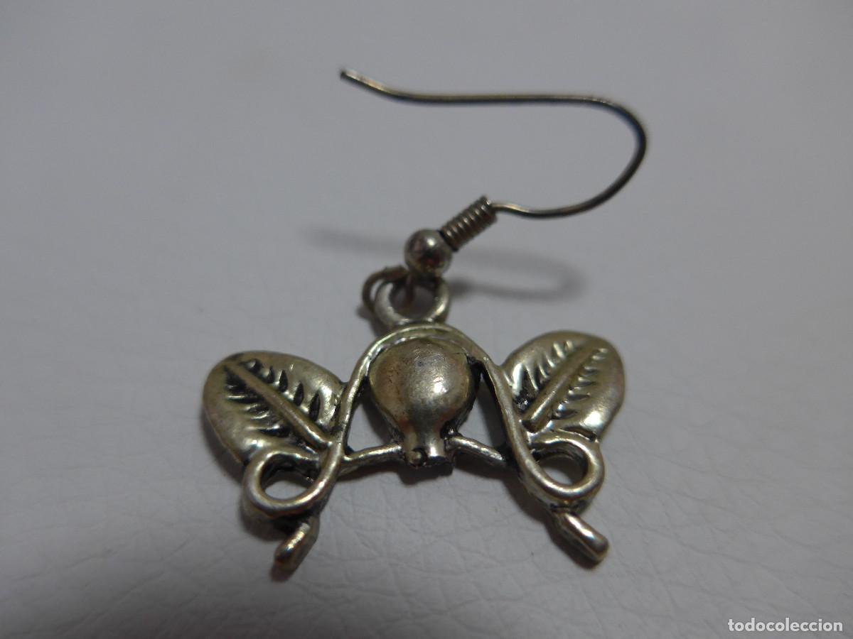 Joyeria: PENDIENTE CON FORMA DE HOJAS