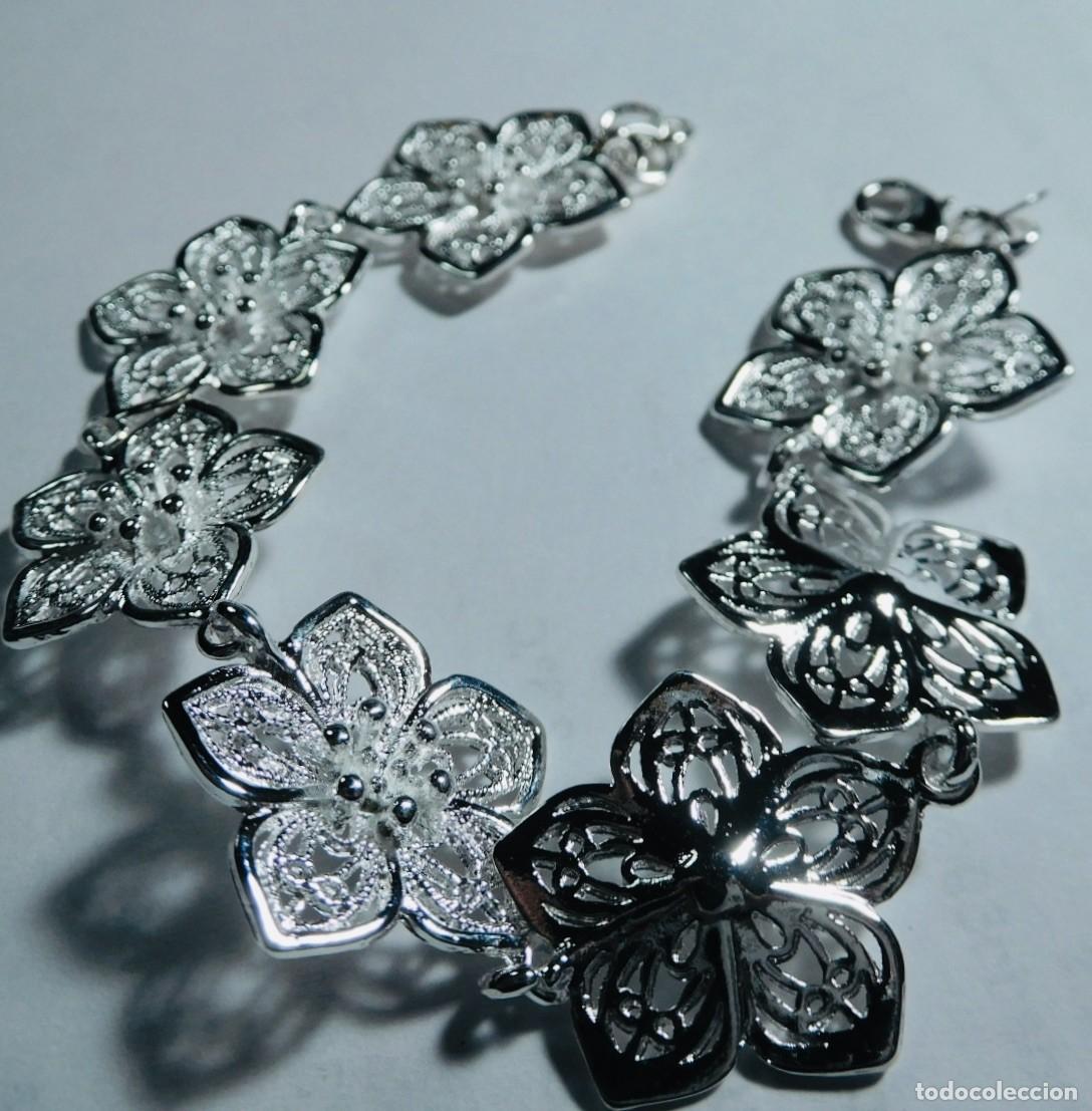 Joyeria: Pulsera de flores de plata.