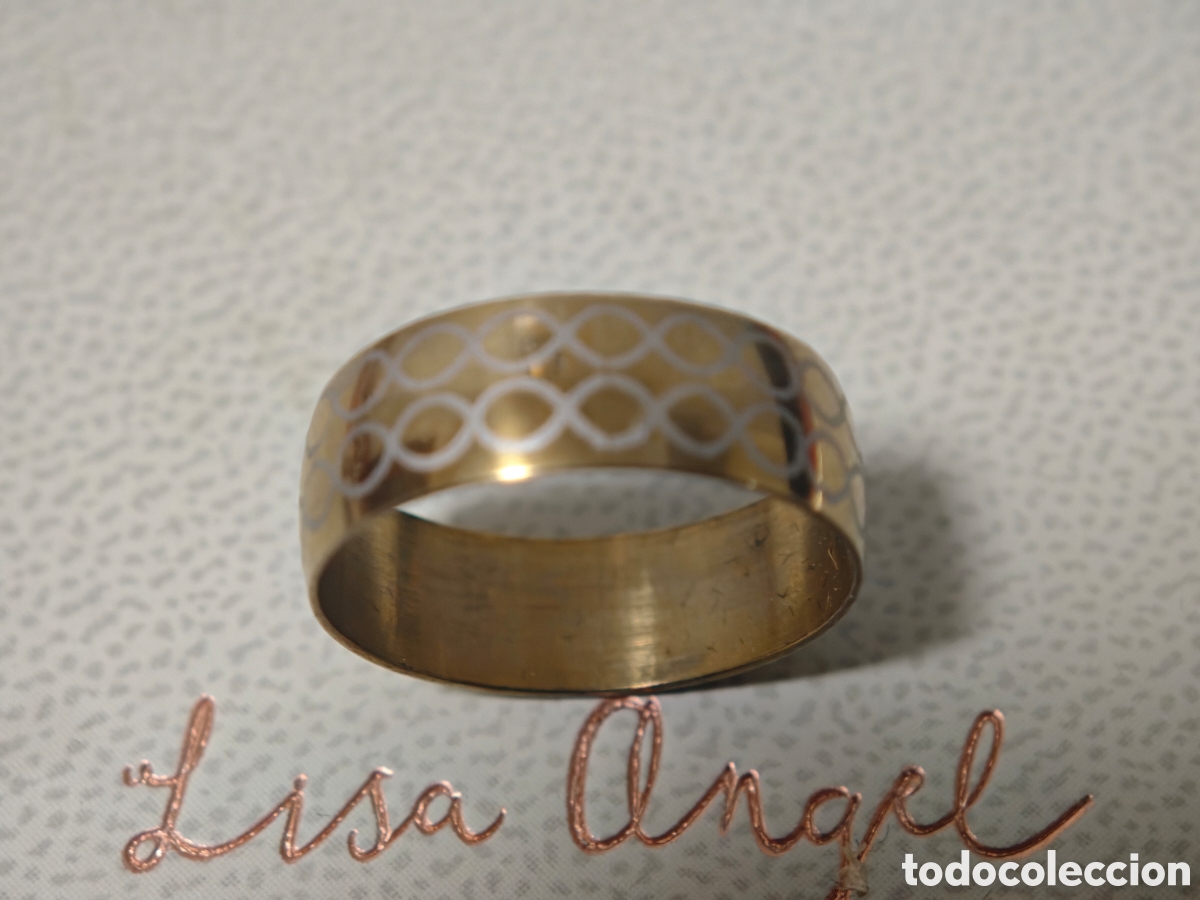 Joyeria: Bonito anillo de acero inoxidable con ba&ntilde;o de oro