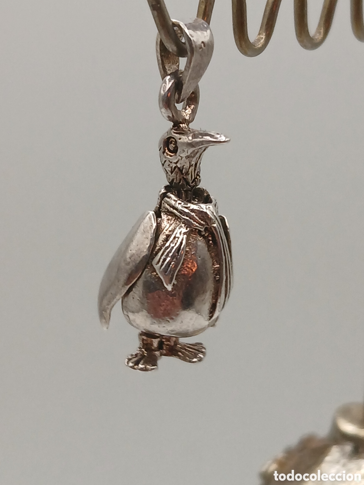 Joyeria: Colgante plata 925mls. Ping&uuml;ino. Alas y cabeza mobiles