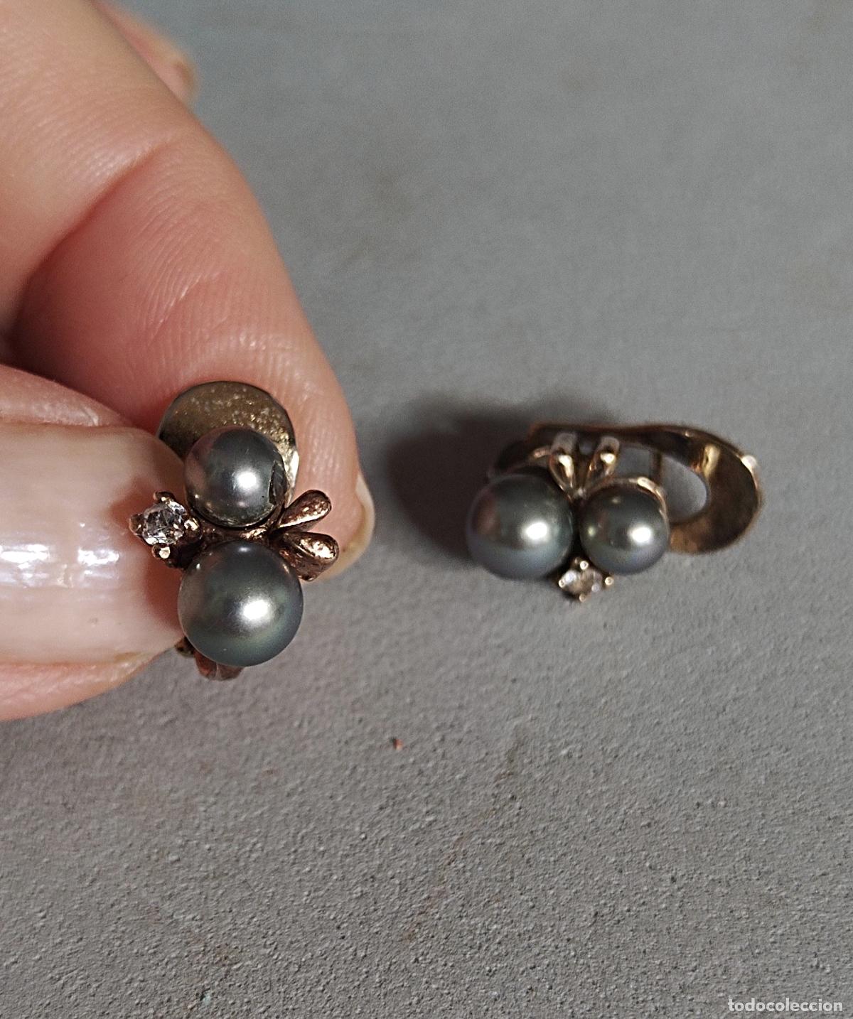 Joyeria: Pendientes de plata de ley contrastada , con perla gris y circonitas.