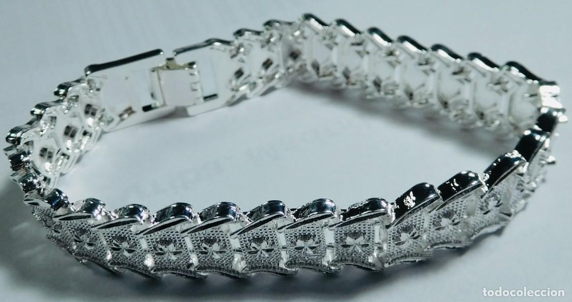 Joyeria: Pulsera de plata ley 925, de eslabones ancha con dise&ntilde;o diamantado, dorso de drag&oacute;n