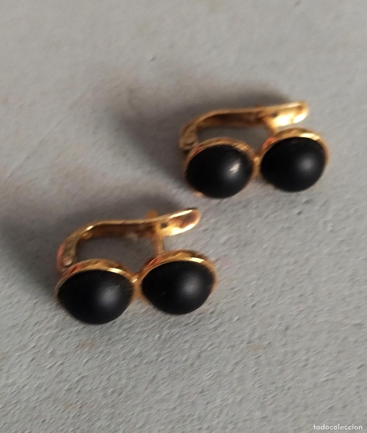 Joyeria: Pendientes de plata de ley contrastada y piedras negras,con ba&ntilde;o de oro, cierre catal&aacute;n.
