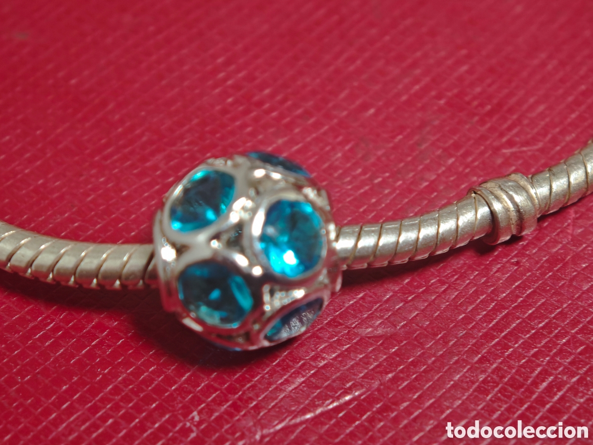 Joyeria: Bonito charm en plata y cristal azul