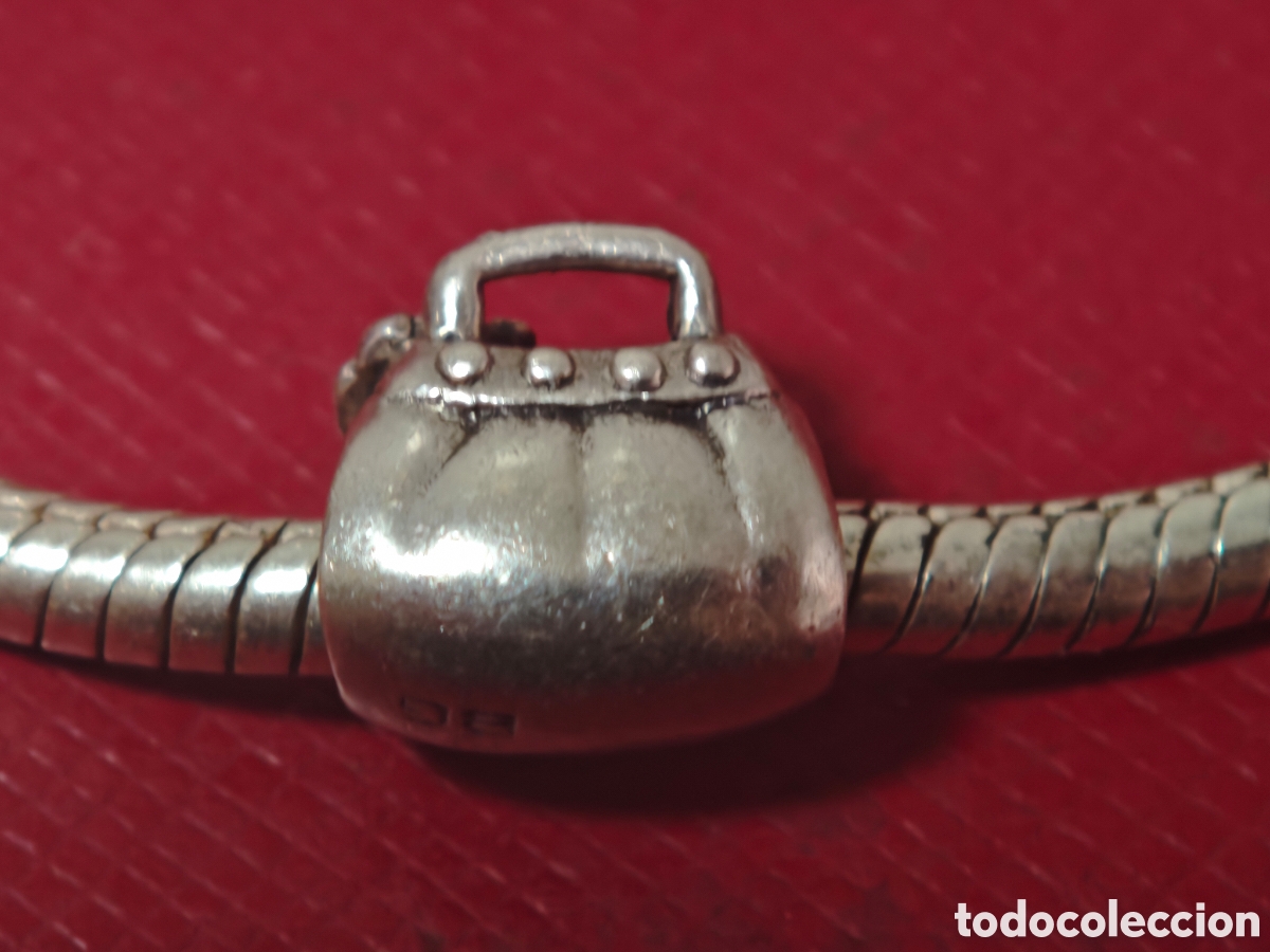 Joyeria: Bonito charm de bolso en plata de ley